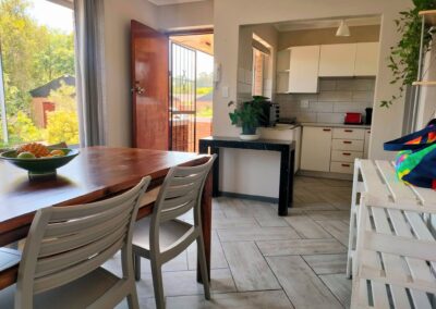 Unit 1 - dining area and kitchen and entrance